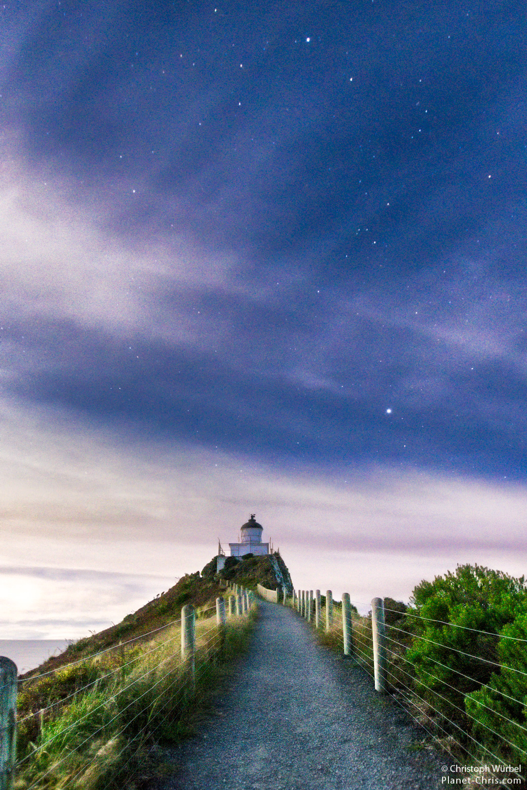 Stars over the Nugget Point lighthouse, New Zealand